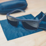 Cross Vision Sunglasses with black frames and black lenses, faith-based accessory