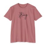 She Is Strong Tee with cross design symbolizing strength in Christ